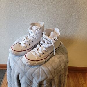 White High-Top Converse Sneakers with Red Accent